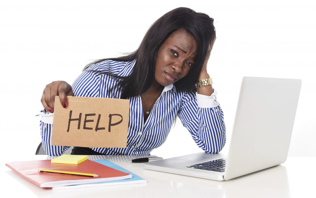 black American frustrated woman working in stress at office